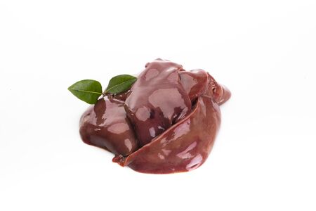Several fresh, raw, pork livers isolated on a white background, decorated with bay leaves. Meat, offal. Packshot.の写真素材