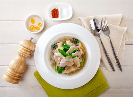 Fried noodle with pork, seefood, broccoliの写真素材