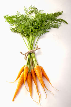 Fresh carrots isolated on white background.の写真素材