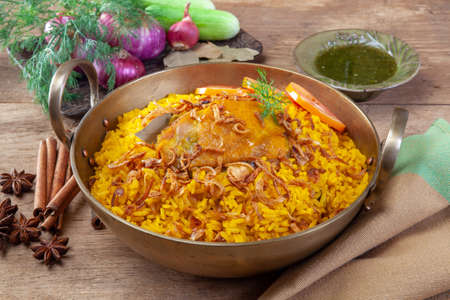 yellow rice with chicken or chicken biryani with riceの写真素材