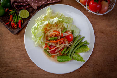 Thai papaya salad or Som Tum Isolated on the white backgroundの写真素材