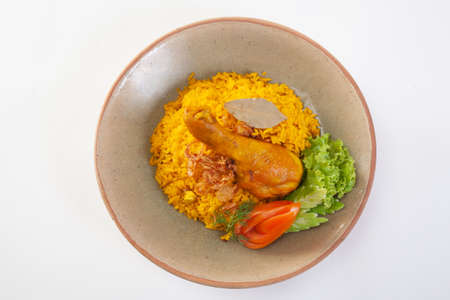 yellow rice with chicken or chicken biryani with riceの写真素材