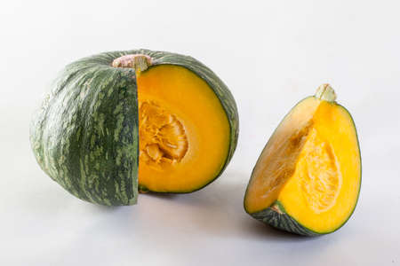 Japanese pumpkin on wooden boardの写真素材
