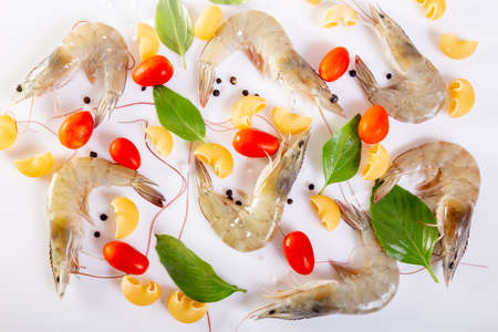 Cooking pasta with shrimpの写真素材