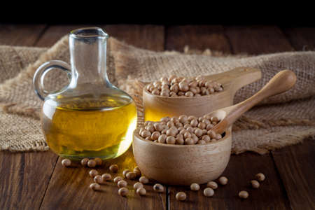 Soybean oil and Soybean on woodenの写真素材