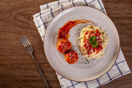 Spaghetti pasta with meatballs and tomato sauce.の写真素材