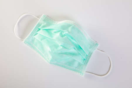 Mask with rubber ear strapsto cover the mouth and nose for protection germs.の写真素材