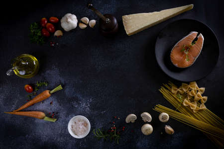 Food, Macaroni, Pasta, Spaghetti. Composition from pasta on a background blackの写真素材