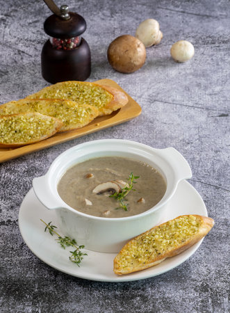 Champignon Mushroom Soup with Garlic Breadの写真素材
