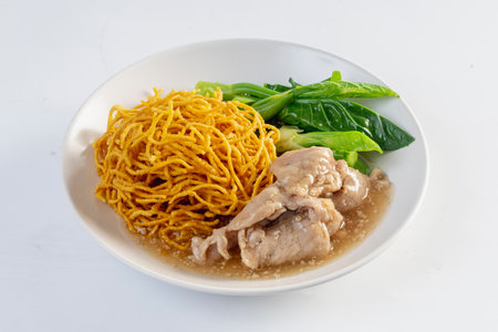 Noodles in Gravy with Pork isolated white backgroundの写真素材