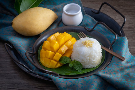 mango with sticky rice is popular traditional dessert of thailand.の写真素材
