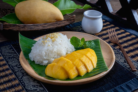 mango with sticky rice is popular traditional dessert of thailand.の写真素材