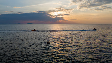 Sunset at Bang Saen sea, Chonburi province, Thailandの写真素材