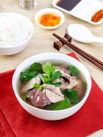 Pork Blood Soup In a white bowl on a wooden table