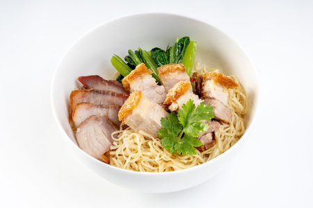 Red pork and crispy pork noodles isolated on white background