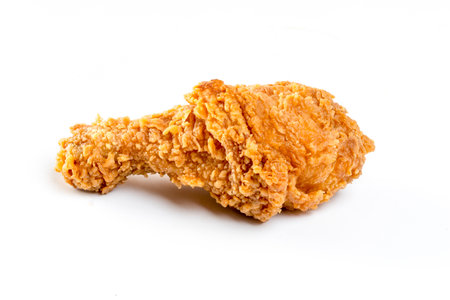 Fried chicken leg isolated on white background.の写真素材