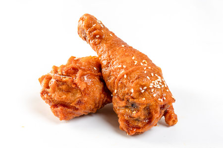 Fried chicken with Korean sauce on white backgroundの写真素材
