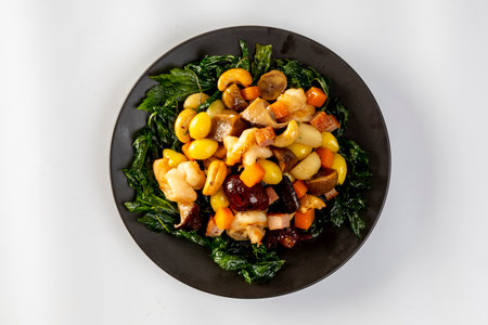 Stir fried mixed Chinese fruits and nuts  on a white backgroundの写真素材