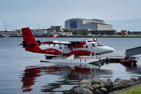 Copenhagen, Europe, seaplane at jetty, harbor buildings in backgroundのeditorial素材