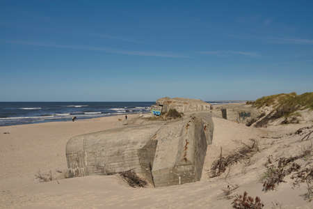 bunker ruin at beach near Houvig, Jutland, Denmark, ocean in backgroundの写真素材