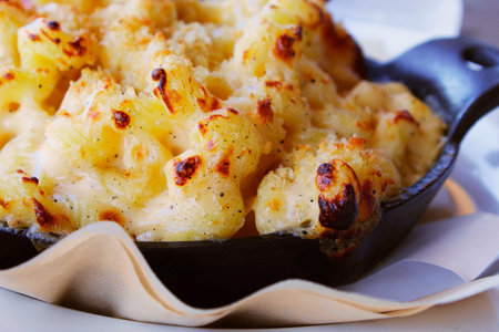 Delicious golden baked n' cheese in a cast-iron dish to warm you up on a cold autumn day.