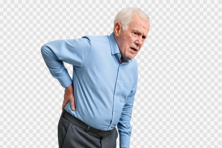 senior man expressing pain with his hand on his lower back, visible on a transparent surface.の素材
