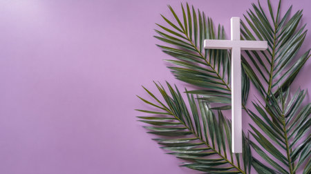 A serene palm sunday image featuring a white cross resting on green palm leaves against a soft purple background, perfect for easter designs.の素材