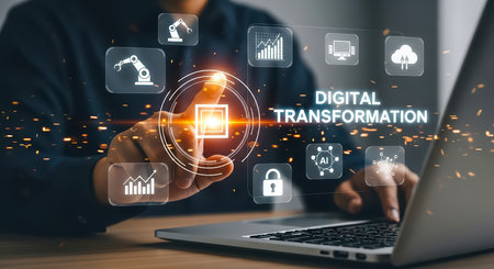 A person interacts with digital transformation interface on a laptop, symbolizing technological advancement and innovation in business.の素材