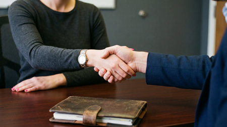 Business people shaking hands, finishing up a meeting. Handshake conceptの素材