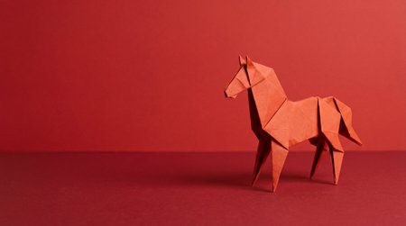 A festive outdoor scene at night featuring illuminated red lanterns and a Christmas tree creating a warm and inviting atmosphere for celebration.の素材