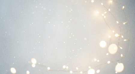 An ethereal and magical backdrop with glowing yellow lights creating a beautiful bokeh effect against a pale serene background Ideal for festive designsの素材