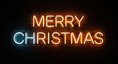 A bright and colorful neon sign displaying the words Merry Christmas in a festive orange and blue glow against a deep black background, perfect for holiday greetings.の素材