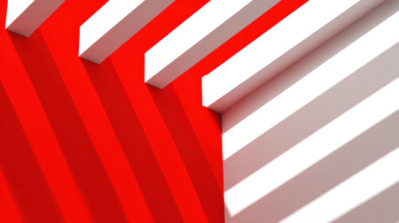A striking abstract image featuring a bold red surface contrasted with a white surface, divided by sharp diagonal lines and casting distinct shadows.の素材