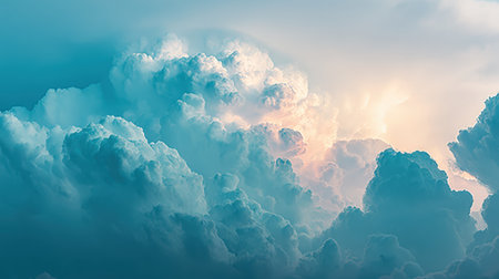 A breathtaking view of towering cumulonimbus clouds, bathed in the warm glow of the sun, creating a dramatic and awe-inspiring sky.の素材