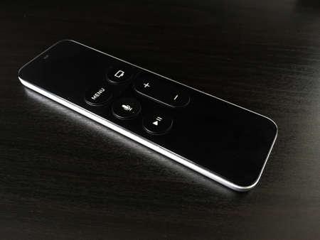 Black Smart Remote Control On Black Tableの写真素材