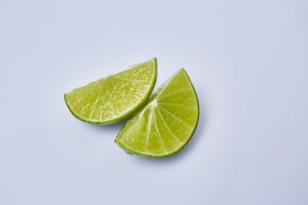 Limes slice on white backgroundの写真素材