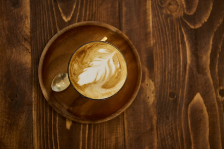 Cup of coffee on wood tableの写真素材