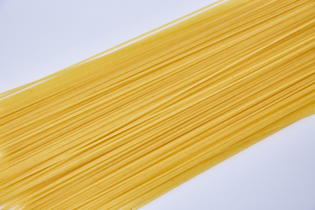 Raw spaghetti on white backgroundの写真素材