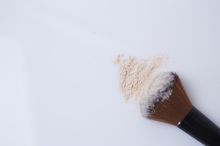 Brush and powder on white backgroundの写真素材