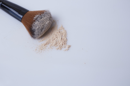 Brush and powder on white backgroundの写真素材
