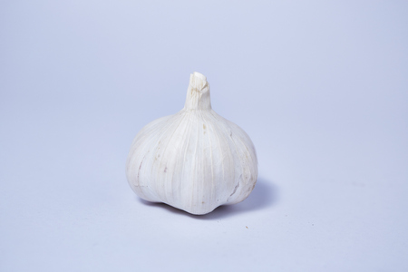Fresh garlic on white backgroundの写真素材