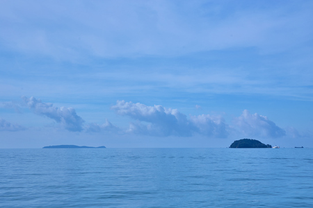 Dreamy island in Andaman ocean with exotic blue skyの写真素材