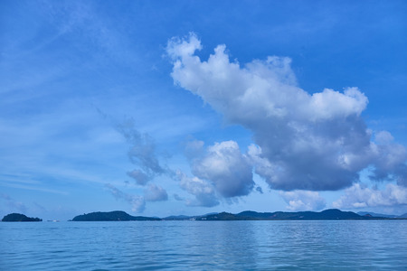 Dreamy island in Andaman ocean with exotic blue skyの写真素材
