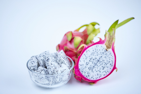 Fresh dragon fruit slice in bowl on white backgroundの写真素材