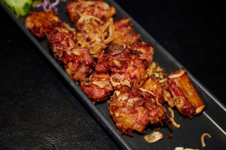 Deep fried pork ribs with fried garlic