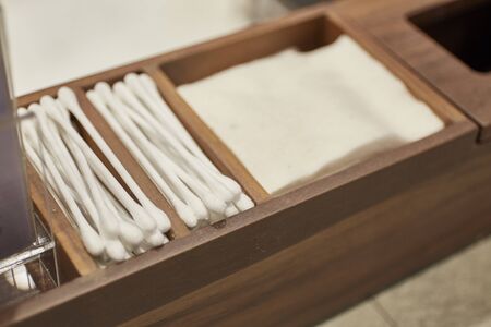 Organic cotton and cotton buds in wooden box.の写真素材
