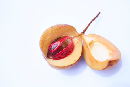 Fresh Nutmeg on white backgroundの写真素材