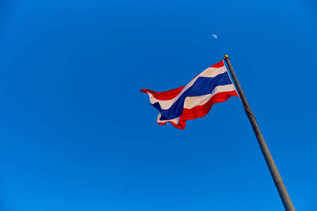 Flag of Thailand with vivid blue skyの写真素材