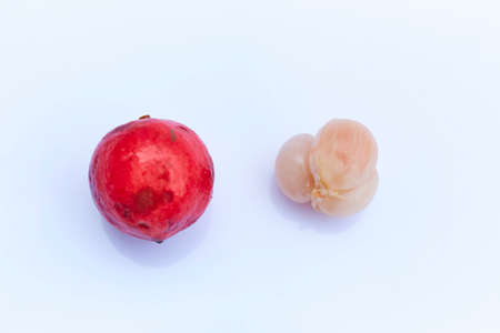 Red Burmese grape on white backgroundの写真素材