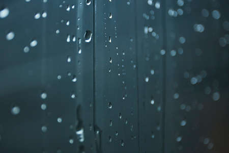 Water drops on dark transparent backgroundの写真素材